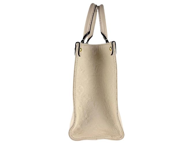 Borsa On-the-Go PM in Monogram Empreinte Louis Vuitton Crudo - vista 2