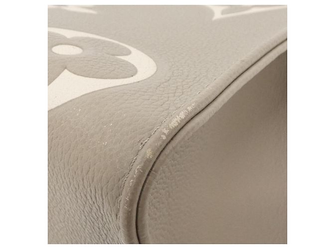 Borsa OnTheGo Monogram Empreinte Louis Vuitton Beige Grigio - vista 2