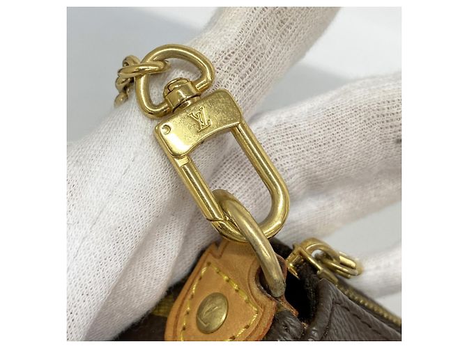 Pochette Eva Monogramma Louis Vuitton M95567 in Marrone - vista 8