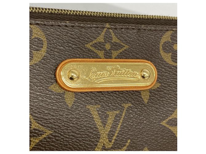 Pochette Eva Monogramma Louis Vuitton M95567 in Marrone - vista 9