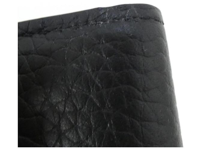 Cartera Compacta Capucines en Taurillon Louis Vuitton Negro - vista 3
