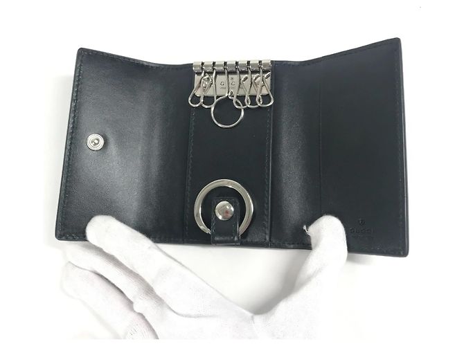 Portachiavi in pelle goffrata GG Gucci Nero - vista 7