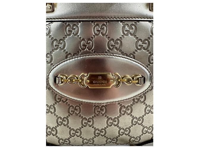 Bolsa Gucci em couro laminado dourado - vista 11