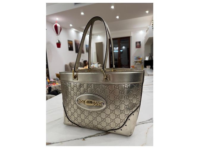Bolsa Gucci em couro laminado dourado - vista 6