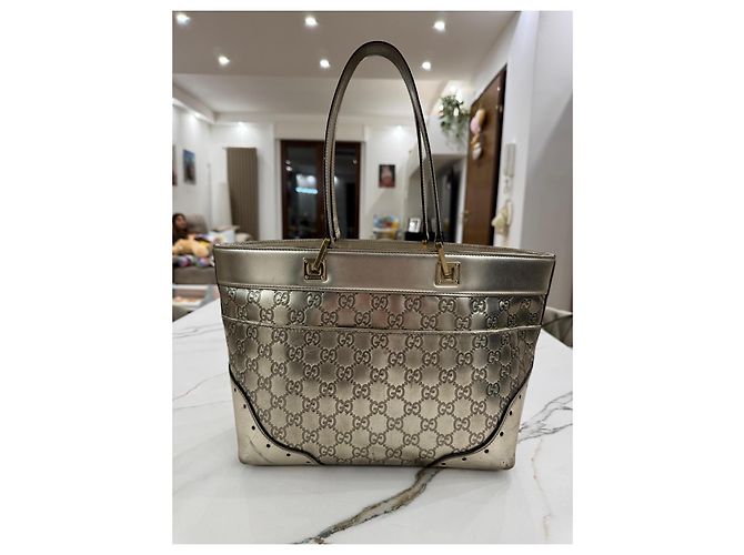 Bolsa Gucci em couro laminado dourado - vista 7