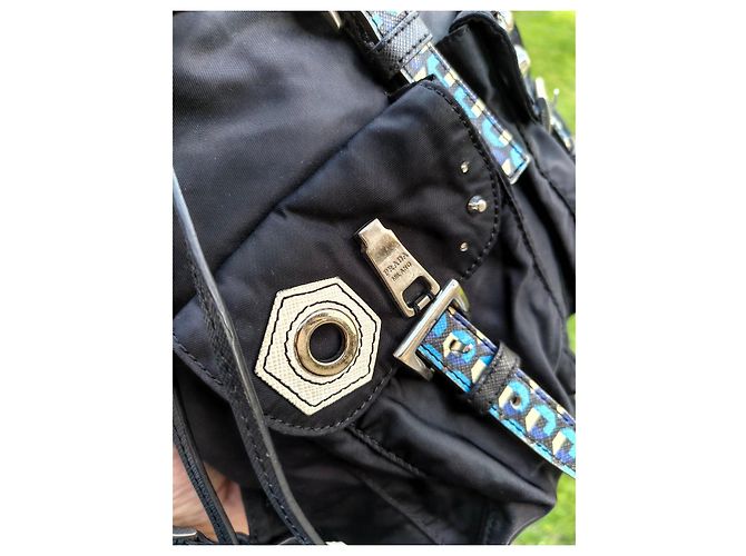 Prada black nylon backpack adorned with blue and white details - view 4