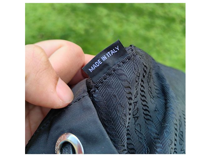 Prada black nylon backpack adorned with blue and white details - view 8