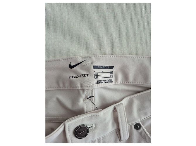 Pantalón beige slim fit Nike golf - vista 4