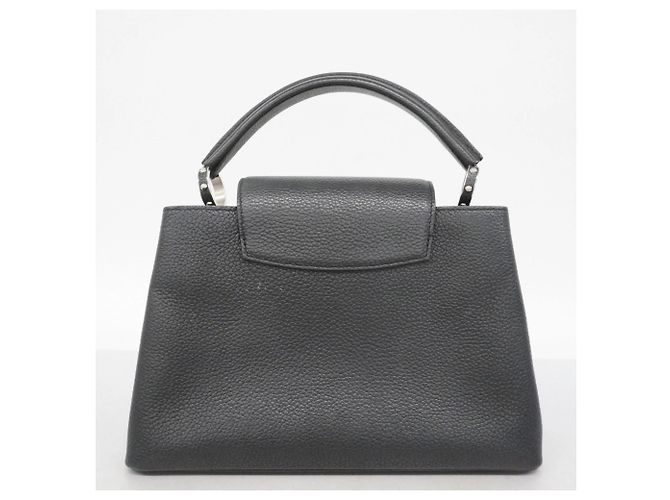 Borsa Louis Vuitton Taurillon Capucines PM Nero - vista 14