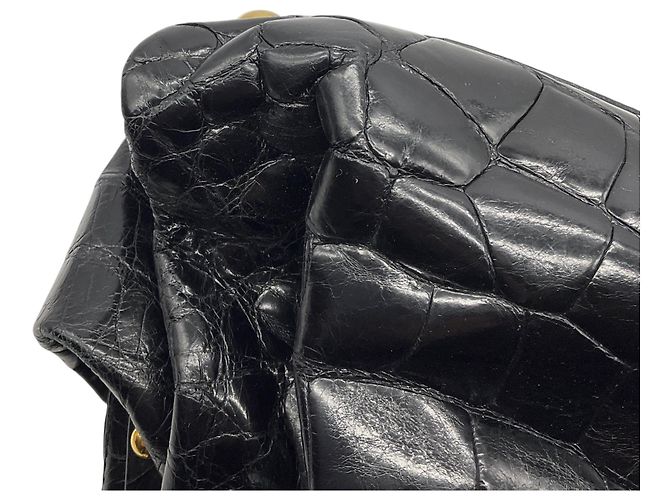 Valentino Garavani Borsa a mano in pelle di coccodrillo nera con borchie e hardware dorato Valentino Nero - vista 13