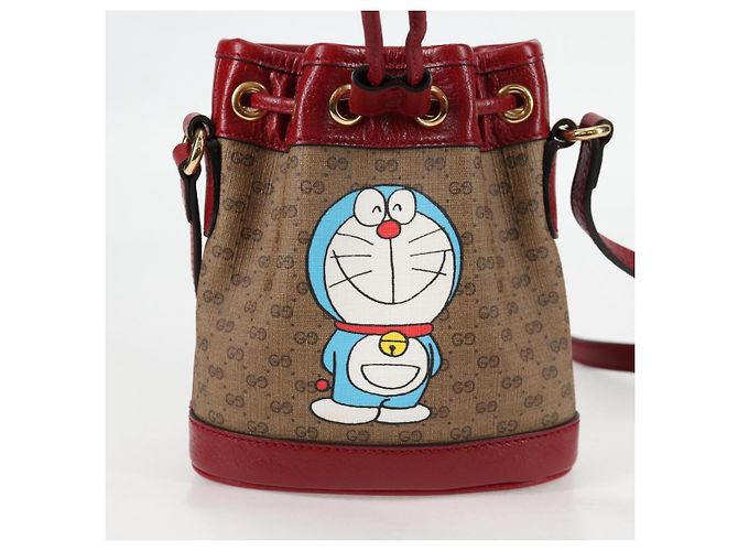 Borsa di collaborazione GUCCI Micro GG Supreme Doraemon in PVC beige e oro Auth 132450SAM D'oro - vista 14