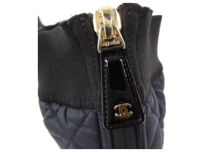 Timeless 2-in-1 Stiefel aus Lackleder mit COCO-Logo-Design von Chanel Schwarz - Ansicht 12