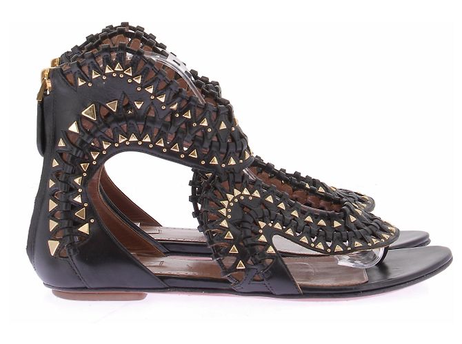Alaïa Sandali piatti neri e dorati Nero - vista 2