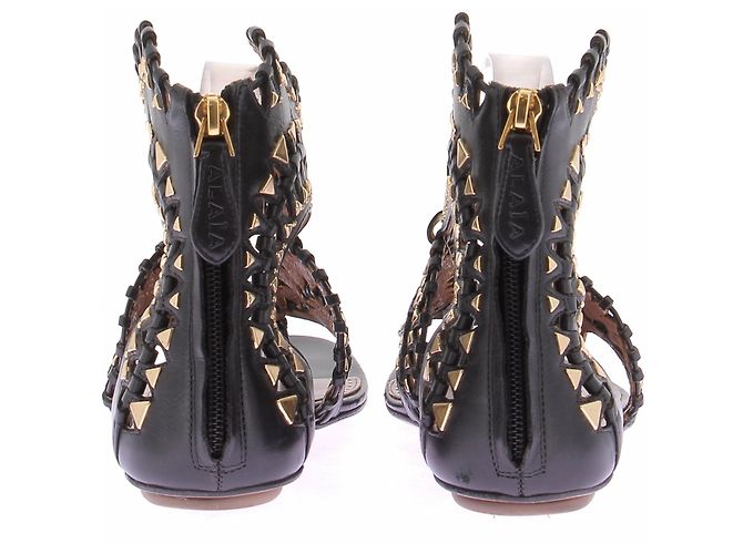 Alaïa Sandali piatti neri e dorati Nero - vista 5