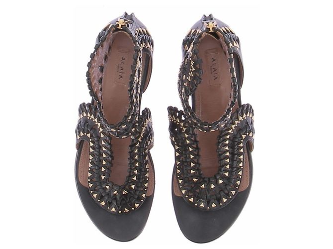 Alaïa Sandali piatti neri e dorati Nero - vista 6