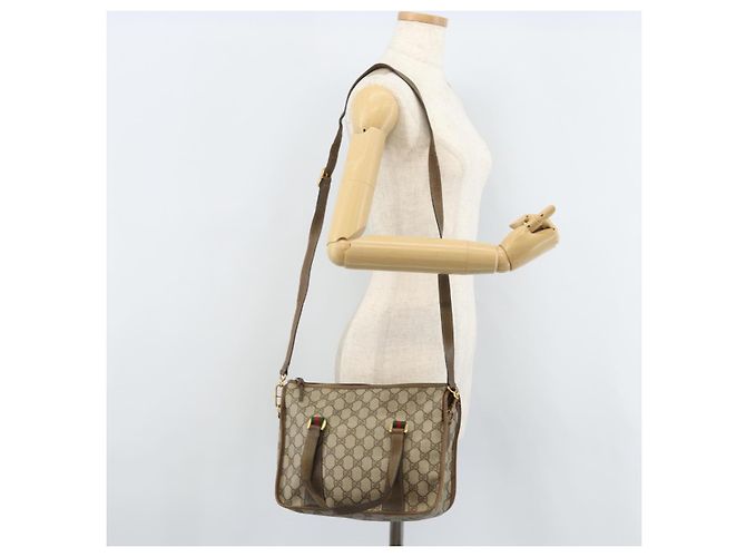 Borsa tote Gucci GG Supreme Web Sherry Line in PVC beige e oro 41 02 039 Auth 171911 D'oro - vista 24