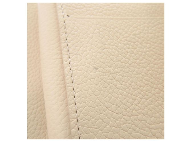 Billetera Compacta Metis Monogram Empreinte IC Chip Crema LOUIS VUITTON Blanco - vista 9