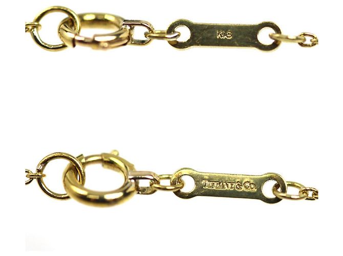 Elsa Peretti Collana in rubino a forma di cuore aperto in oro giallo 18K Tiffany & Co. - vista 4