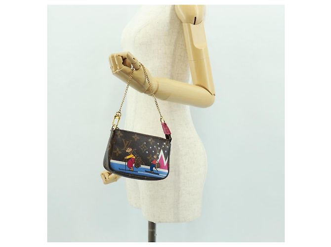 LOUIS VUITTON Mini Pochette Accessori Ski Bear Monogram M67769 171332M Monogramma - vista 23