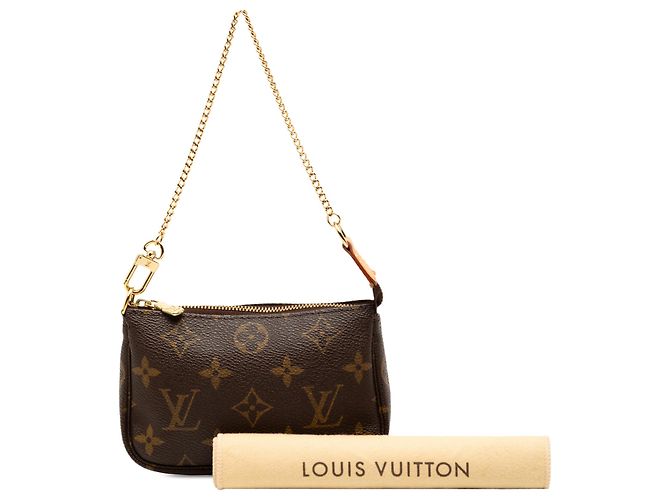 Mini Pochette Accessoires Monogramma Marrone Louis Vuitton - vista 8
