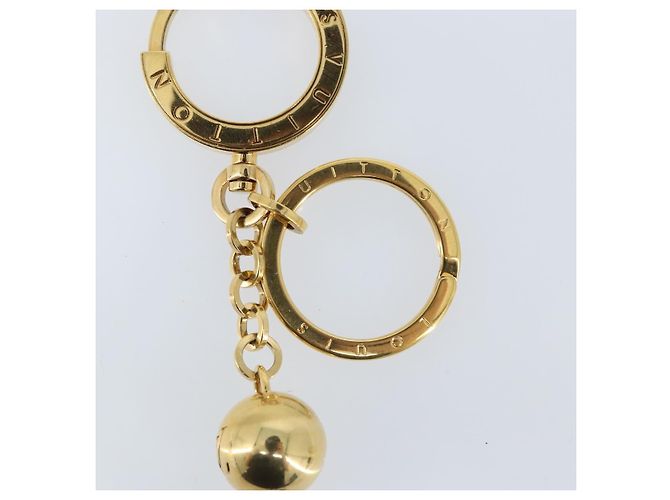 LOUIS VUITTON Llave Swing en metal dorado M65997 LV Auth ARZ269V - vista 4