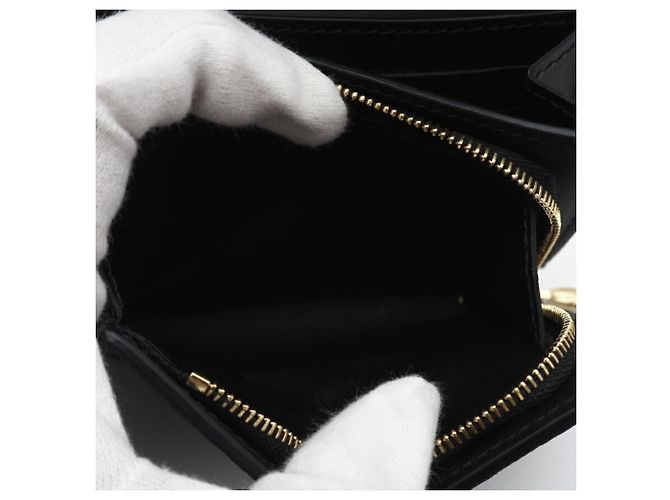 Billetera Tiny Capucines en Taurillon Louis Vuitton Negro - vista 11