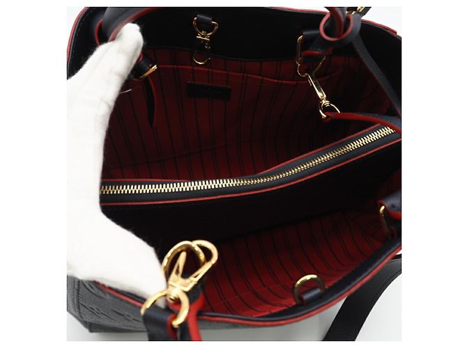 Bolso de Hombro Montaigne MM Empreinte Louis Vuitton Roja Azul marino - vista 9
