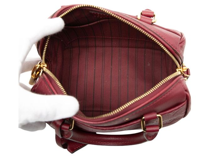 Borsa a Spalla Speedy Bandouliere 20 in Monogram Empreinte Louis Vuitton Rosso Bordò - vista 4