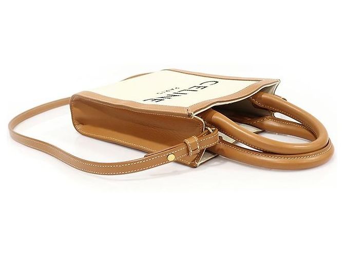 Céline Cabas Mini Vertical em Couro de Bezerro Tan em Lona de Algodão Natural Marrom - vista 3