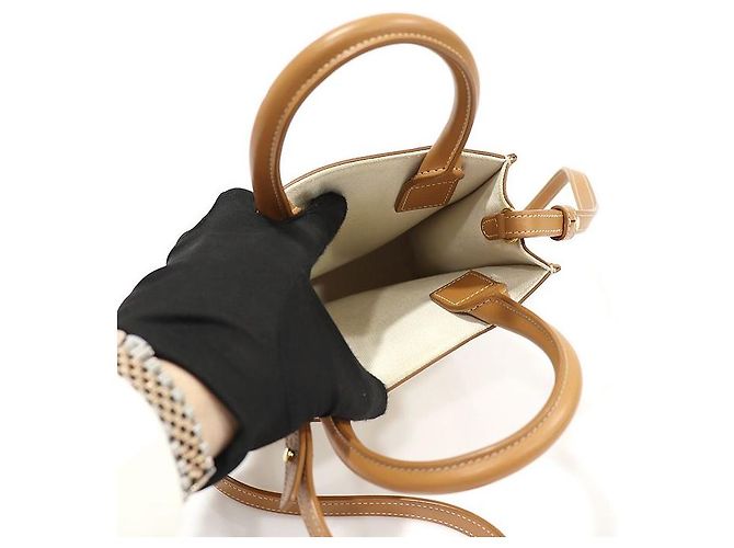 Céline Cabas Mini Vertical em Couro de Bezerro Tan em Lona de Algodão Natural Marrom - vista 5