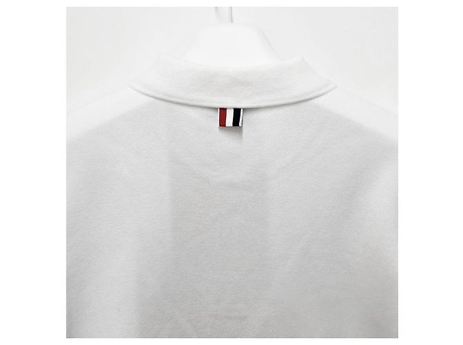 Thom Browne Polo a maniche corte in interlock con tasca e tre righe bianche Bianco - vista 19