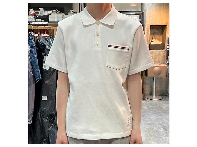 Thom Browne Polo a maniche corte in interlock con tasca e tre righe bianche Bianco - vista 21