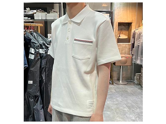 Thom Browne Polo a maniche corte in interlock con tasca e tre righe bianche Bianco - vista 22