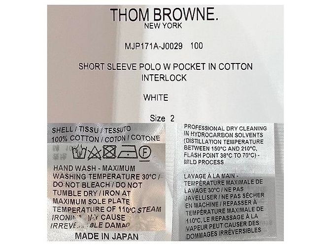 Thom Browne Polo a maniche corte in interlock con tasca e tre righe bianche Bianco - vista 28