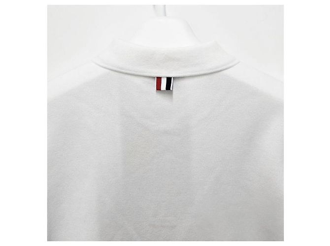 Thom Browne Polo a maniche corte in interlock con tasca e tre righe bianche Bianco - vista 7