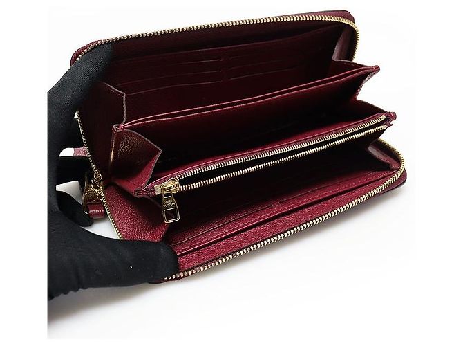 Louis Vuitton Cartera Larga Zippy Monogram Empreinte Raisin Roja - vista 6