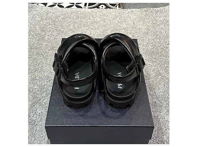 Prada Sandali incrociati in pelle nappa imbottiti con logo triangolare - vista 17