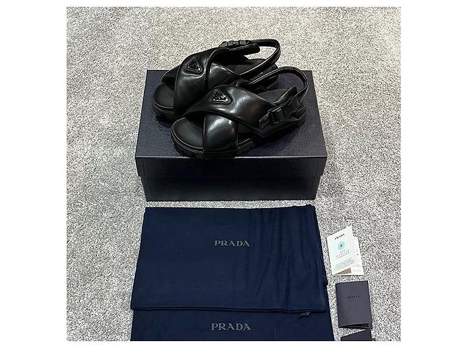 Prada Sandali incrociati in pelle nappa imbottiti con logo triangolare - vista 2