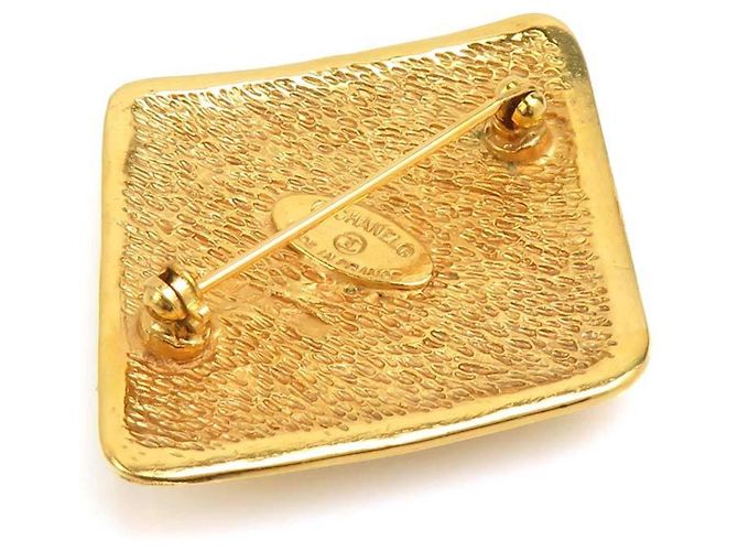 Spilla in metallo dorato Chanel con il marchio Coco D'oro - vista 3