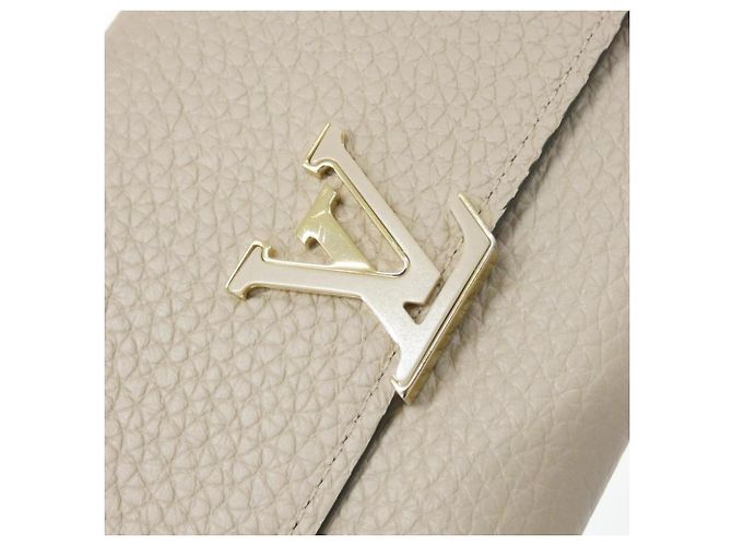 Billetera Compacta Capucines de Louis Vuitton - vista 4