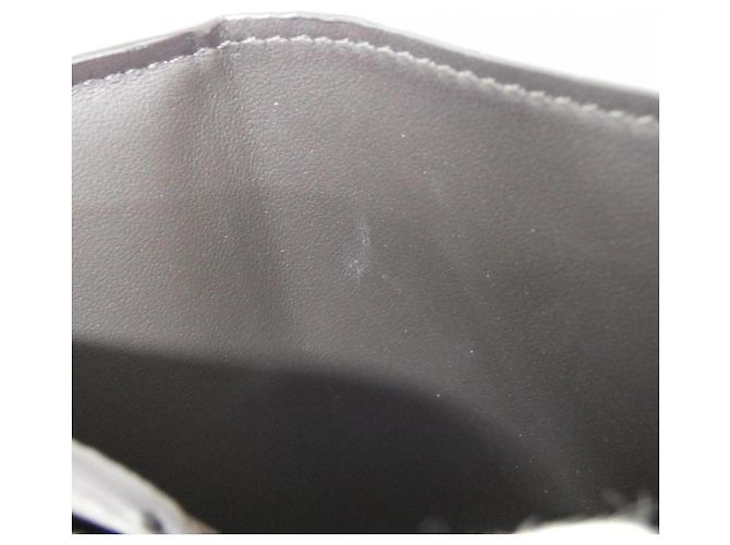 Billetera Compacta Capucines de Louis Vuitton - vista 8
