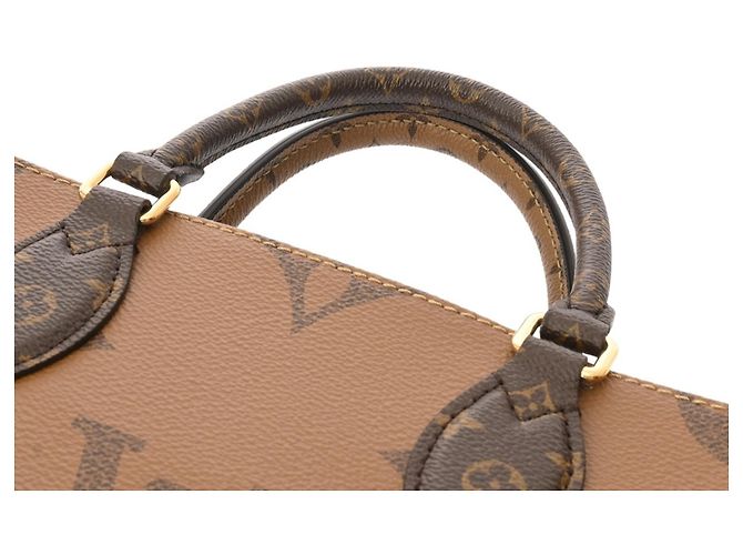 Borsa OnTheGo PM Monogram Reverse Louis Vuitton Marrone - vista 5