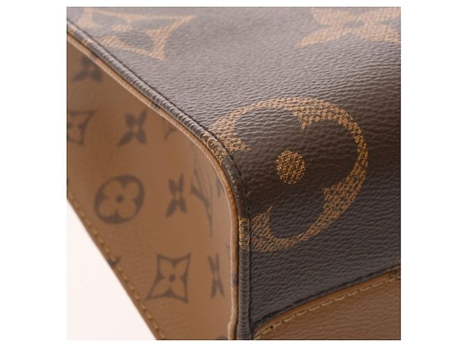 Borsa OnTheGo PM Monogram Reverse Louis Vuitton Marrone - vista 7