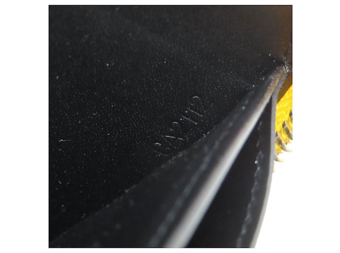 Carteira Zippy Louis Vuitton M91571 Preto Amarelo - vista 7