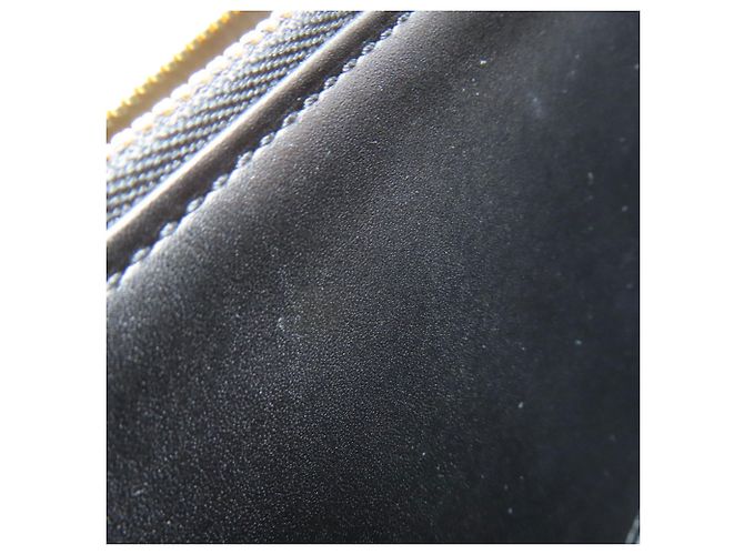 Carteira Zippy Louis Vuitton M91571 Preto Amarelo - vista 8