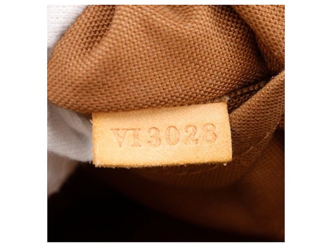 Borsa Louis Vuitton Tivoli PM Marrone Monogramma - vista 17
