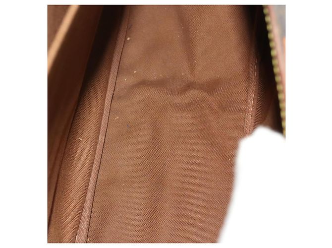 Louis Vuitton Saumur Monogram Canvas 35 Marrone - vista 5