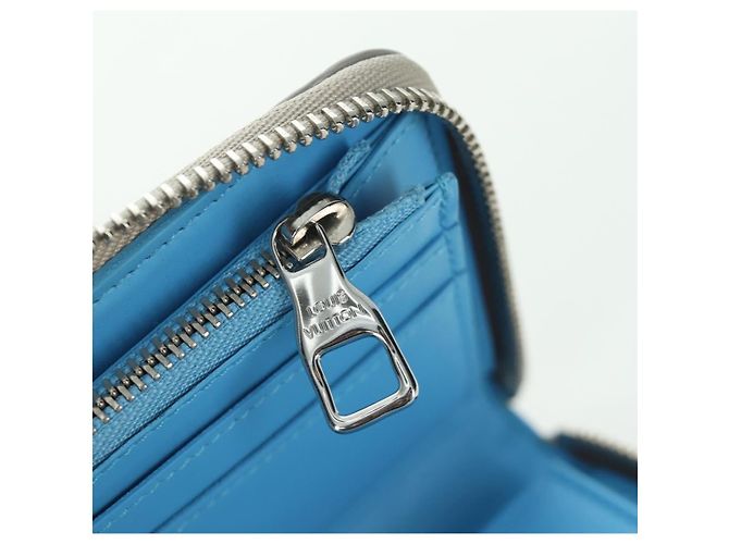 Cartera Vertical Zippy Taurillon Climbing Louis Vuitton Marfil M81573 Auth 172432SAM Crudo - vista 10