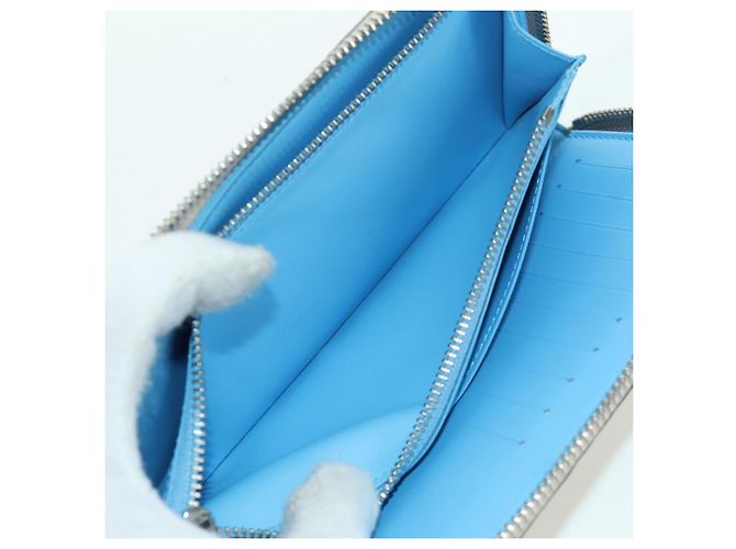Cartera Vertical Zippy Taurillon Climbing Louis Vuitton Marfil M81573 Auth 172432SAM Crudo - vista 11