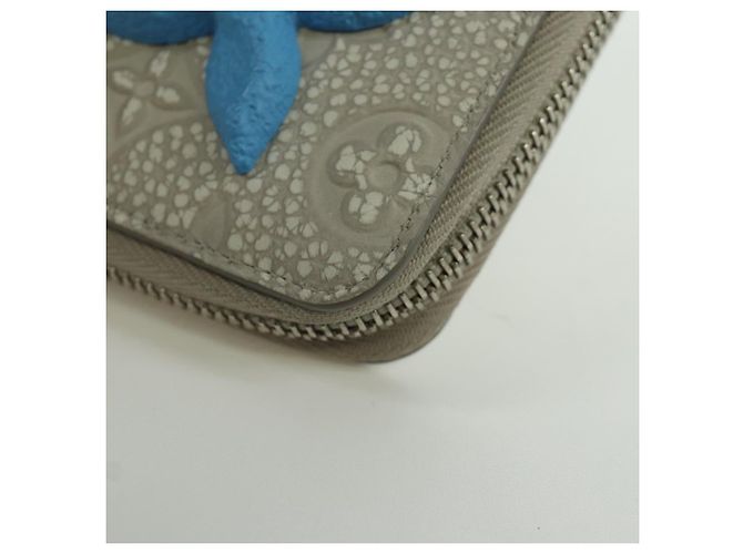 Cartera Vertical Zippy Taurillon Climbing Louis Vuitton Marfil M81573 Auth 172432SAM Crudo - vista 14
